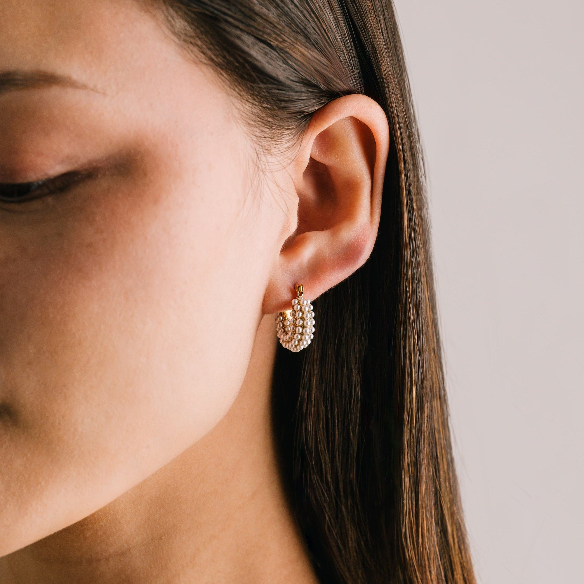 Perla pearl hoop earrings in gold by Lover's Tempo, styled photo